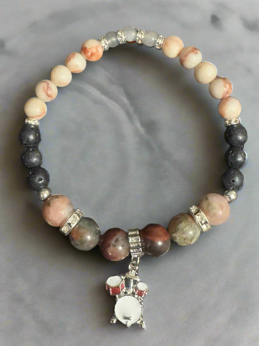 Denise - Beaded Bracelet with Drum Set Dangle Charm